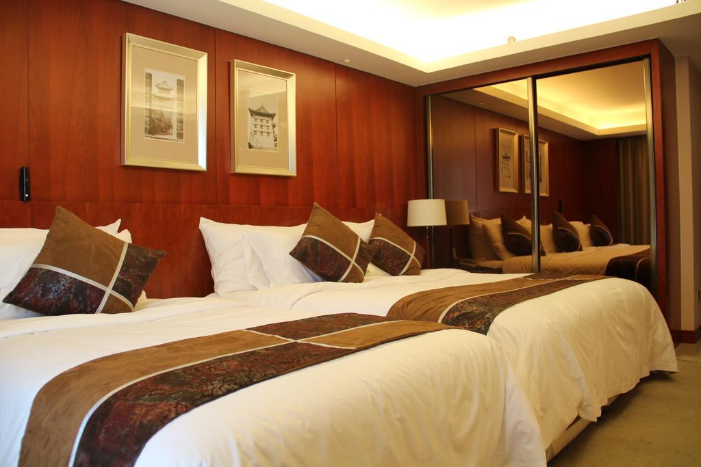 Xi'An Qu Jiang Yin Zuo Hotel Oda fotoğraf